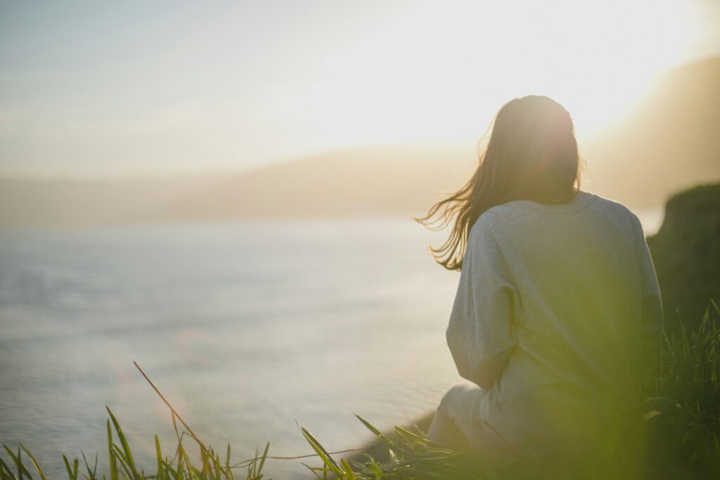 Woman practicing emotional regulation and mindfulness in a calm space